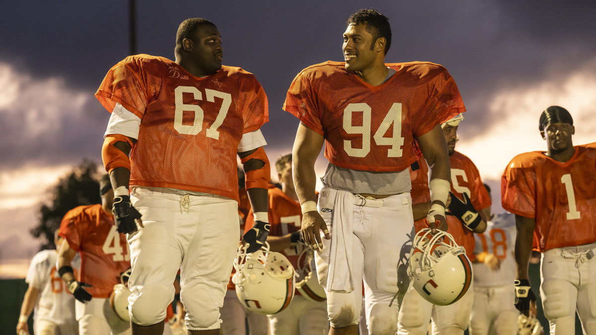 Production still of Wavyy Jonez and Uli Latukefu NBC's "Young Rock"